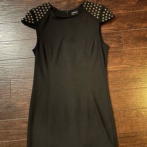 Little black dress with gold studded shoulders